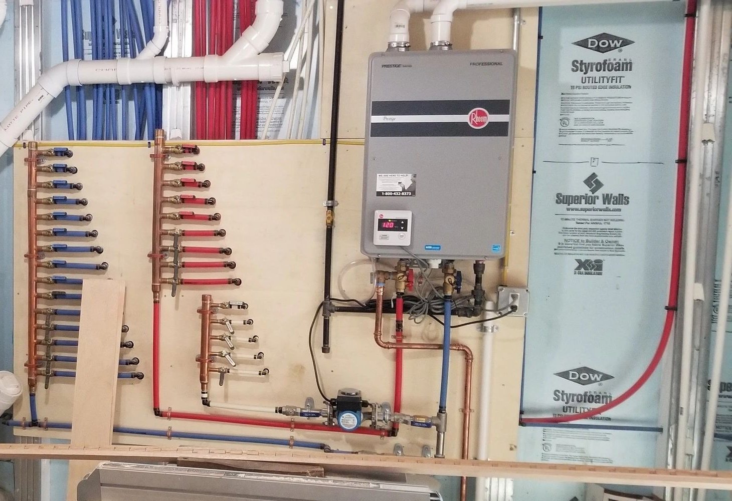 Organized PEX manifold and tankless water heater